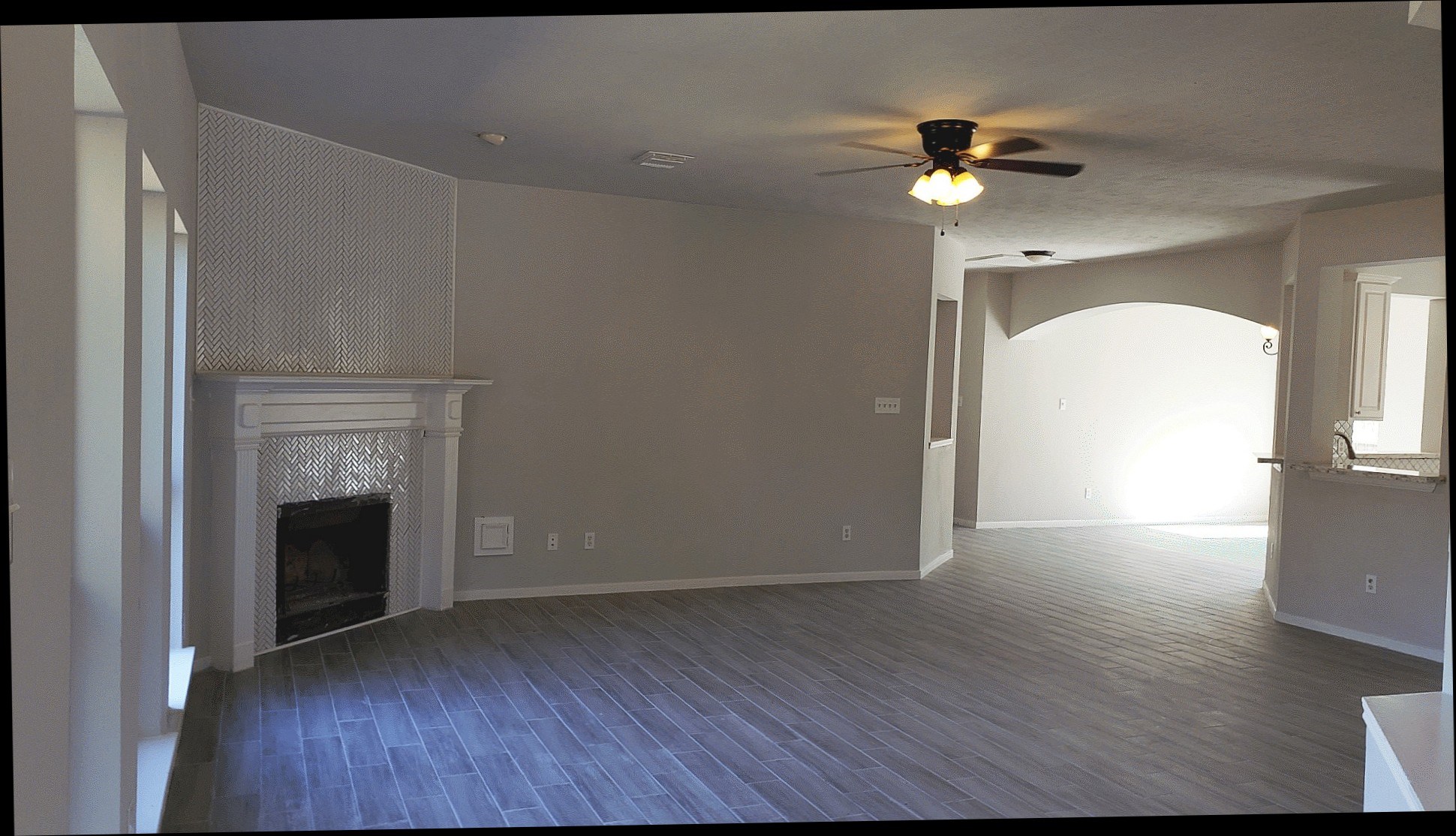 3710 Ransom Road Richmond, TX 77469 - Photo 6 of 42 wooden floor in an empty room with a window