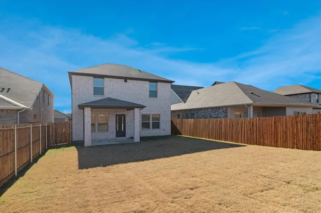 a view of a house with a snow in the background
