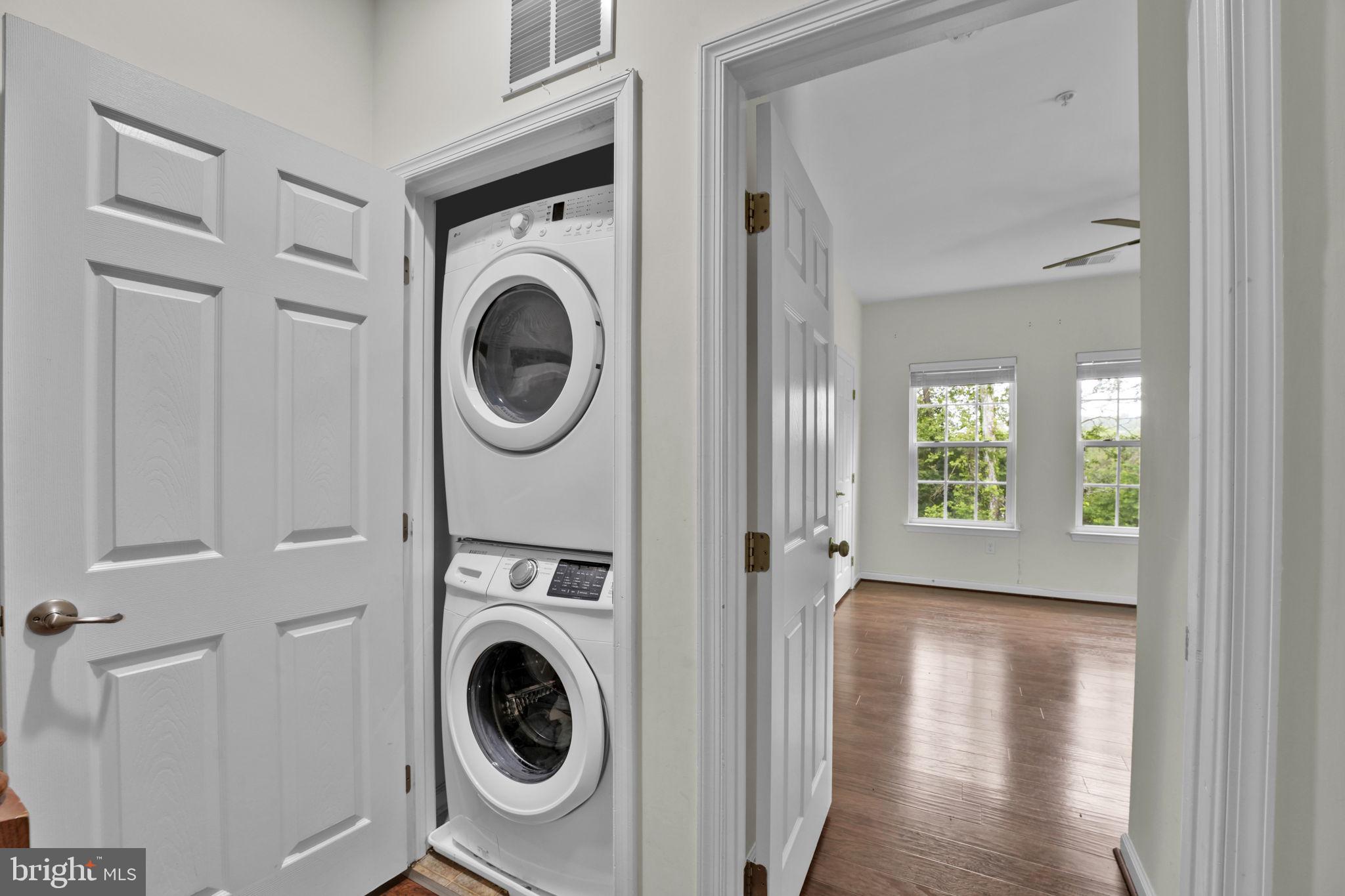 7138 Station House Road Elkridge, MD 21075 - Photo 18 of 42 a view of a bedroom with washer and dryer