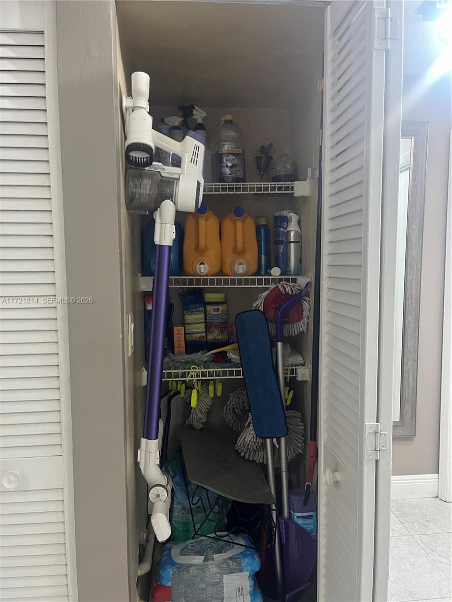 8710 Southwest 3rd Street, Unit 104 Pembroke Pines, FL 33025 - Photo 33 of 46 a view of a room with gym equipment