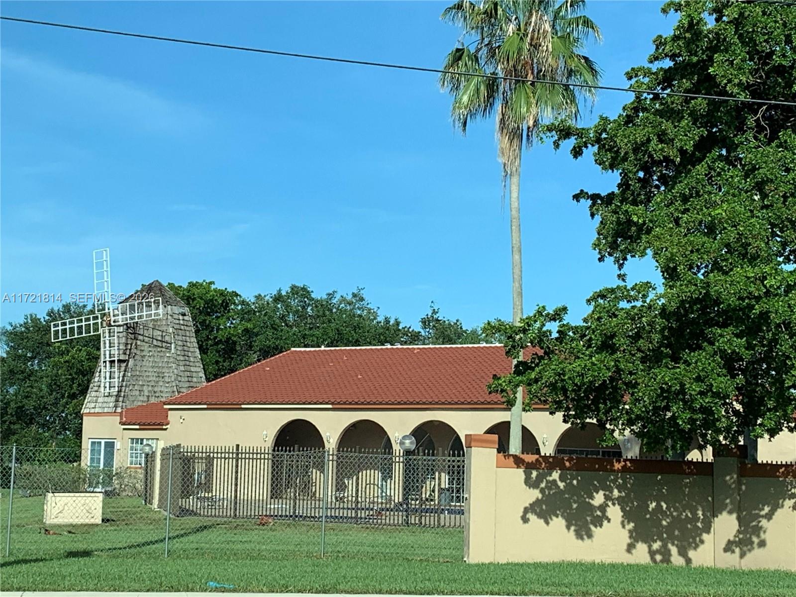 8710 Southwest 3rd Street, Unit 104 Pembroke Pines, FL 33025 - Photo 4 of 46 a aerial view of a house with garden space and lake view