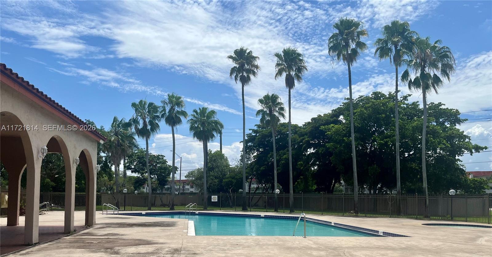 8710 Southwest 3rd Street, Unit 104 Pembroke Pines, FL 33025 - Photo 42 of 46 a view of a backyard