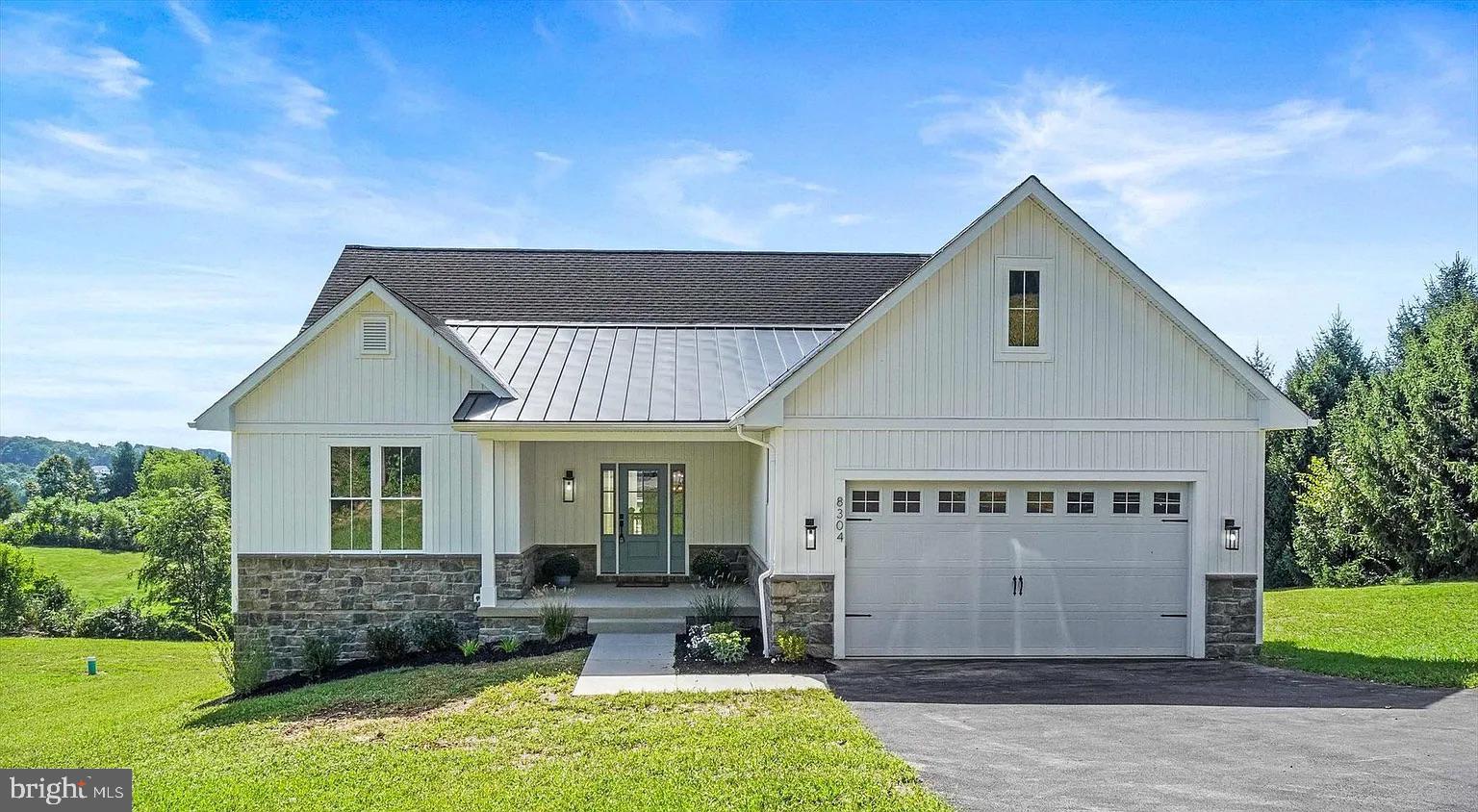 a view of house with backyard