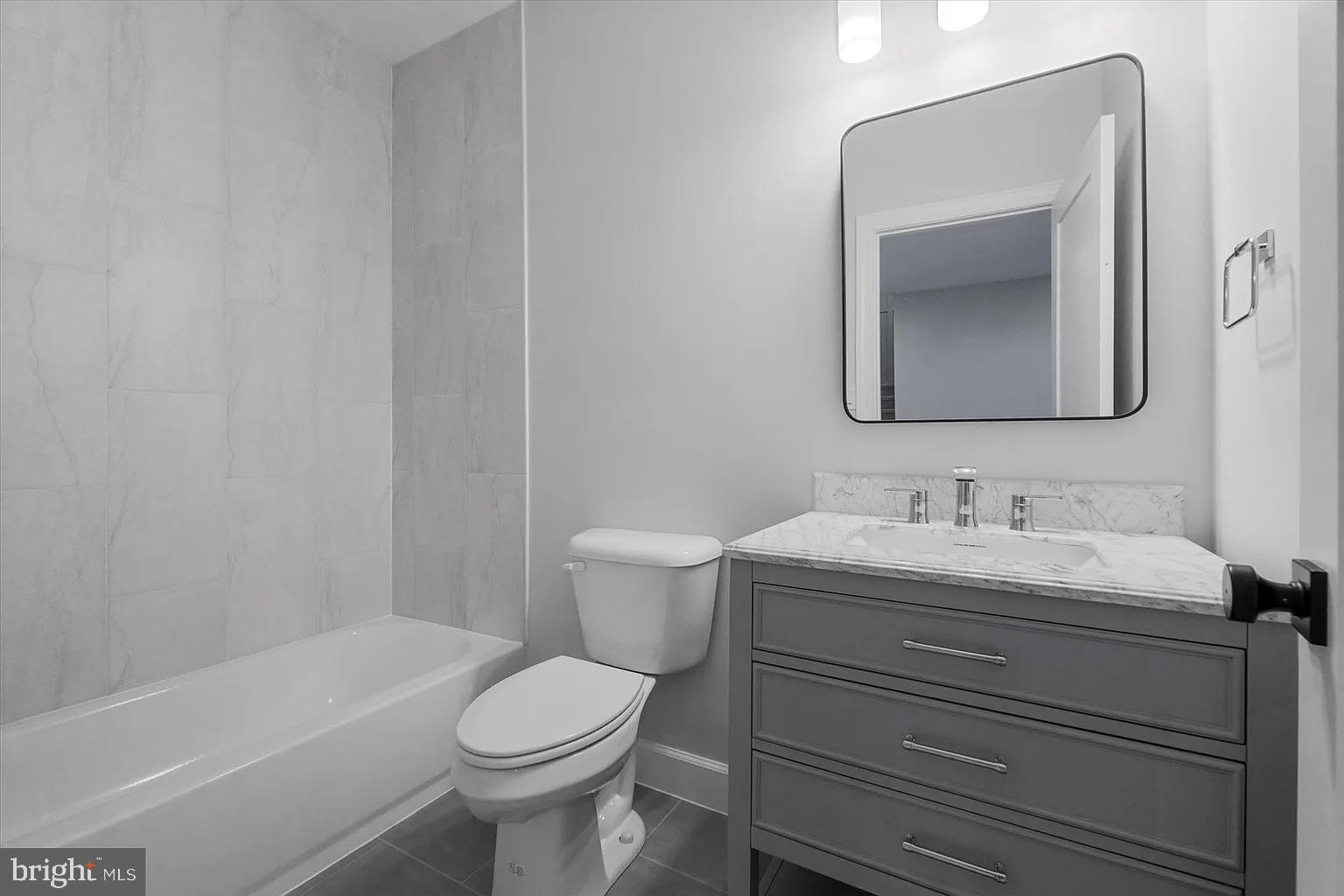 0 Brenneman Road Glen Rock, PA 17327 - Photo 15 of 24 a bathroom with a toilet sink vanity tub and mirror
