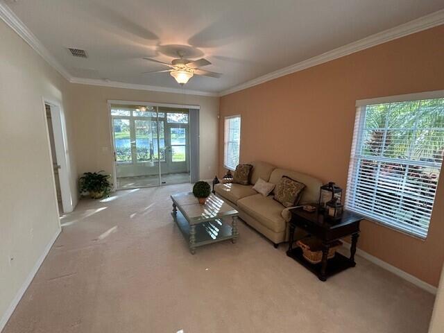 3551 Funston Circle Melbourne, FL 32940 - Photo 14 of 42 a living room with furniture and a large window