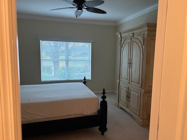 3551 Funston Circle Melbourne, FL 32940 - Photo 19 of 42 a bedroom with a bed and a window