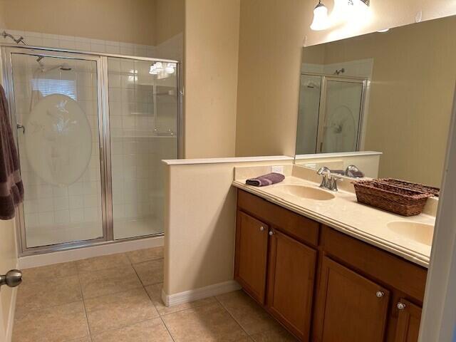3551 Funston Circle Melbourne, FL 32940 - Photo 20 of 42 a bathroom with a sink and a mirror