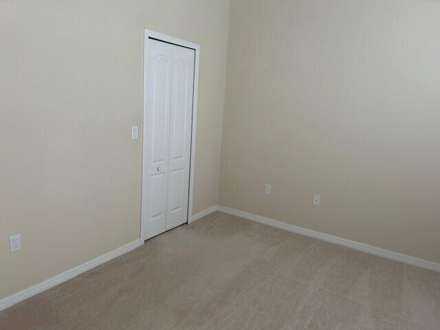 3551 Funston Circle Melbourne, FL 32940 - Photo 26 of 42 an empty room with closet area