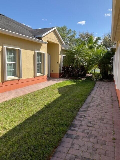3551 Funston Circle Melbourne, FL 32940 - Photo 3 of 42 a view of a house with a backyard