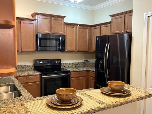 3551 Funston Circle Melbourne, FL 32940 - Photo 7 of 42 a kitchen with a stove and a refrigerator