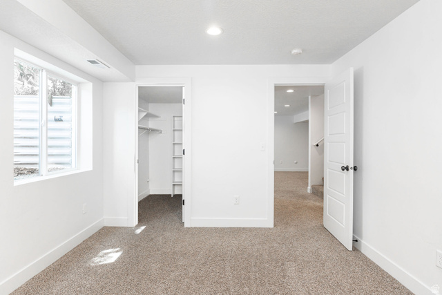 1552 Sumac Drive Logan, UT 84321 - Photo 40 of 72 Bright room with plush carpet flooring and clean white walls