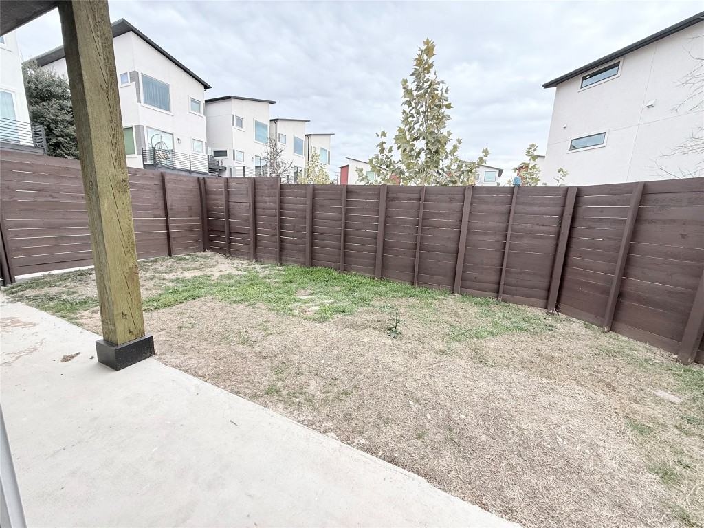 1417 Kramer Lane, Unit 20 Austin, TX 78758 - Photo 14 of 14 View of fenced backyard