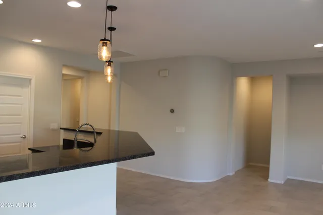a view of a sink and a mirror