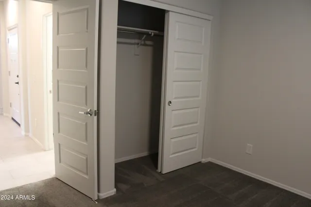 an empty room with closet