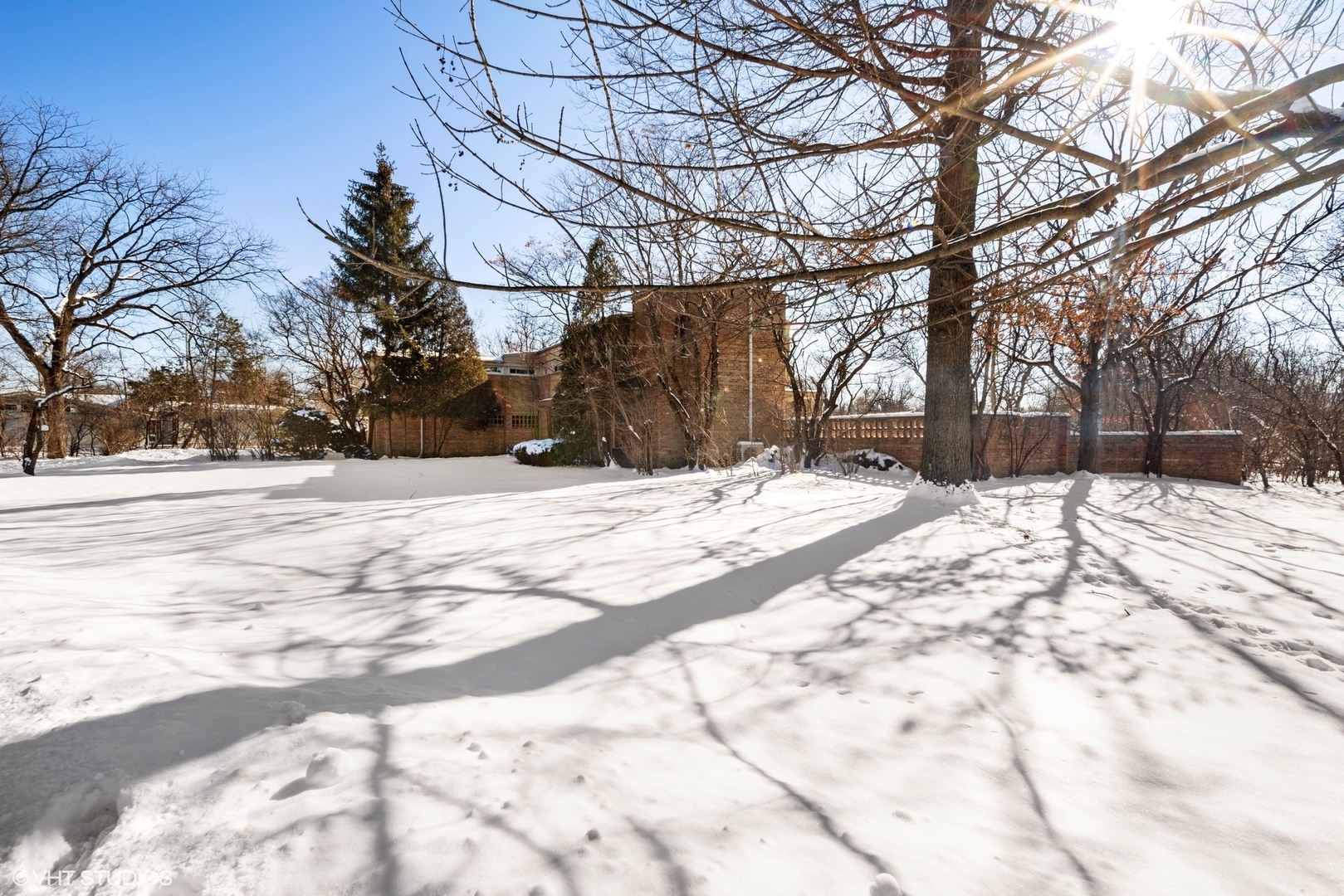 2044 Middlefork Road Northfield, IL 60093 - Photo 2 of 8 a street view covered with snow