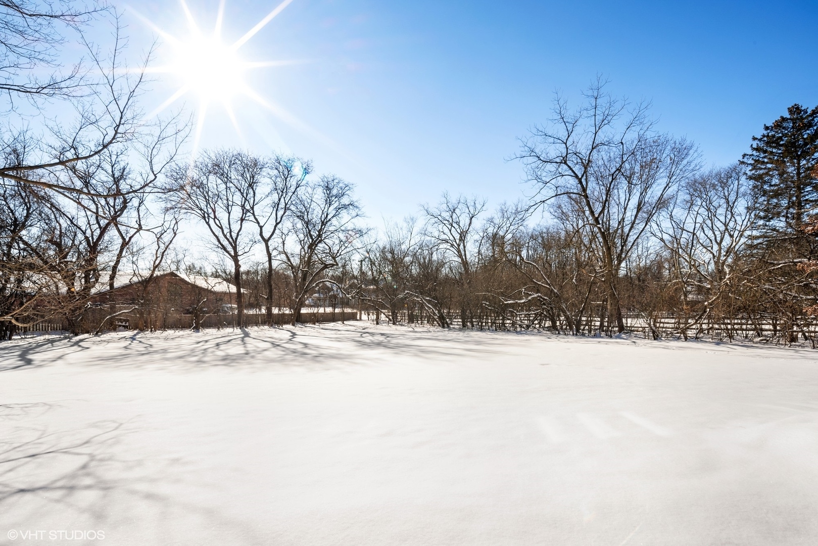 2044 Middlefork Road Northfield, IL 60093 - Photo 8 of 8 a view of a yard covered with snow