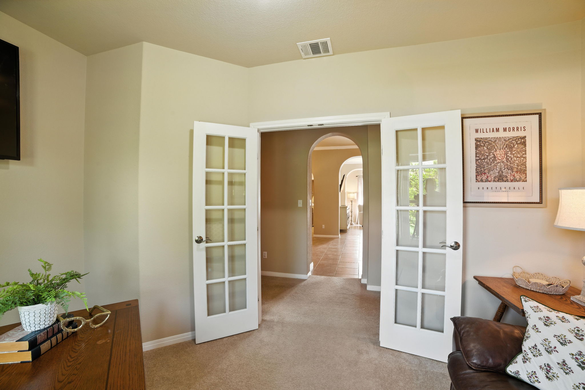 107 Tylee Circle Bastrop, TX 78602 - Photo 12 of 40 a living room with furniture and a potted plant