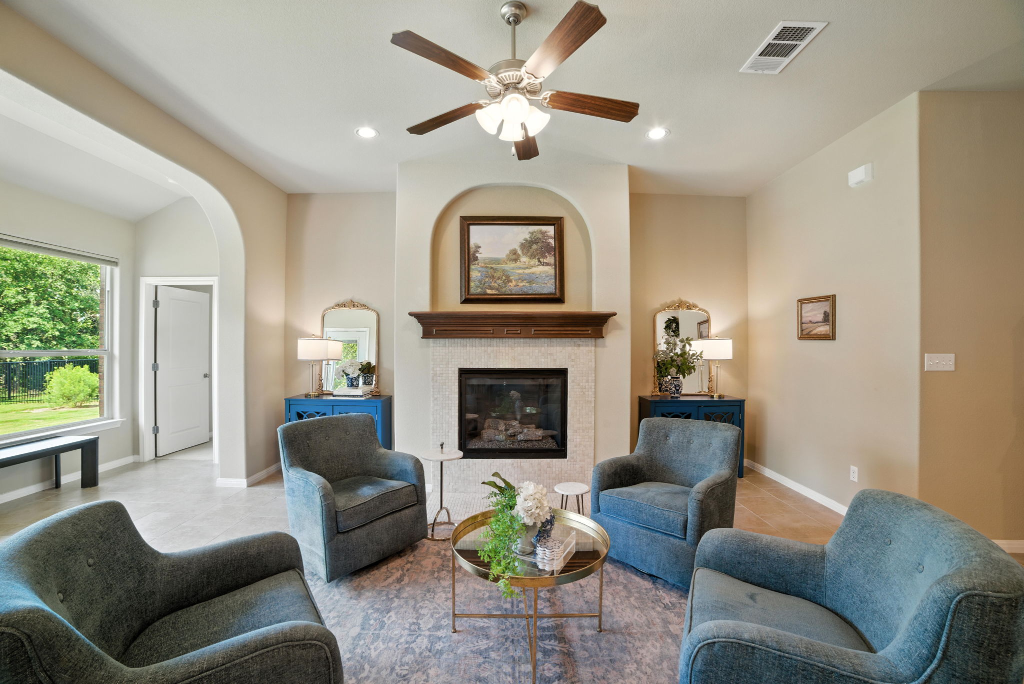 107 Tylee Circle Bastrop, TX 78602 - Photo 24 of 40 a living room with furniture a window and a fireplace