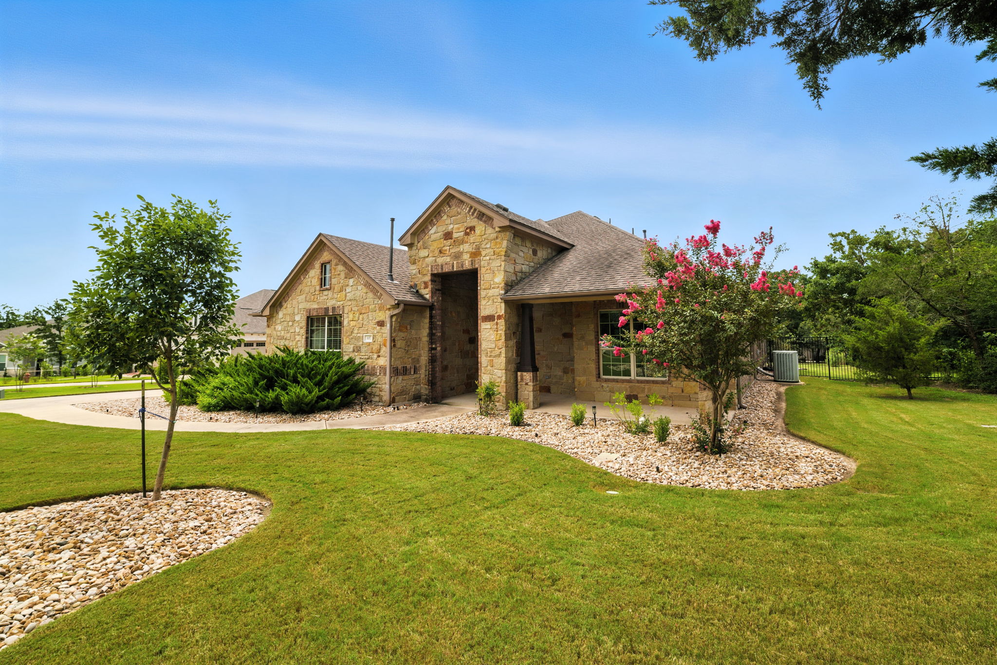 107 Tylee Circle Bastrop, TX 78602 - Photo 3 of 40 a front view of a house with a yard