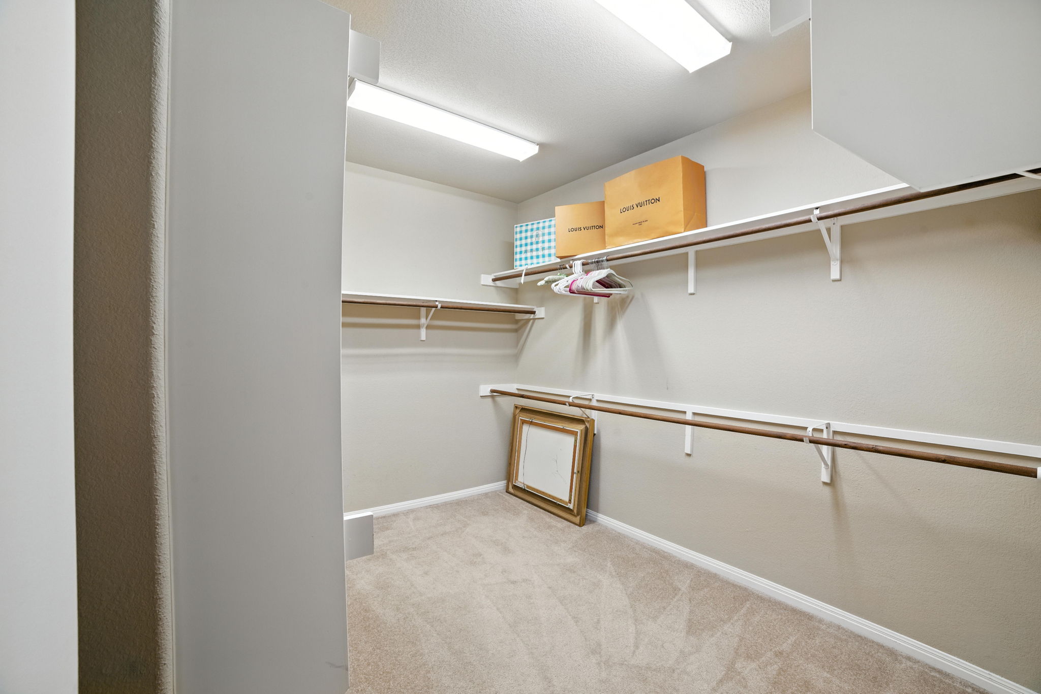 107 Tylee Circle Bastrop, TX 78602 - Photo 32 of 40 a view of an empty walk in closet
