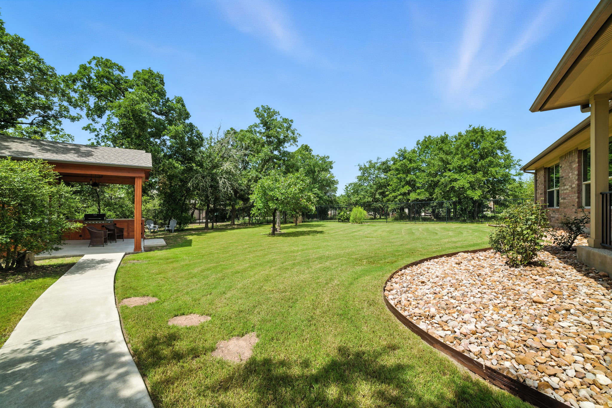 107 Tylee Circle Bastrop, TX 78602 - Photo 34 of 40 a view of a swimming pool with a patio