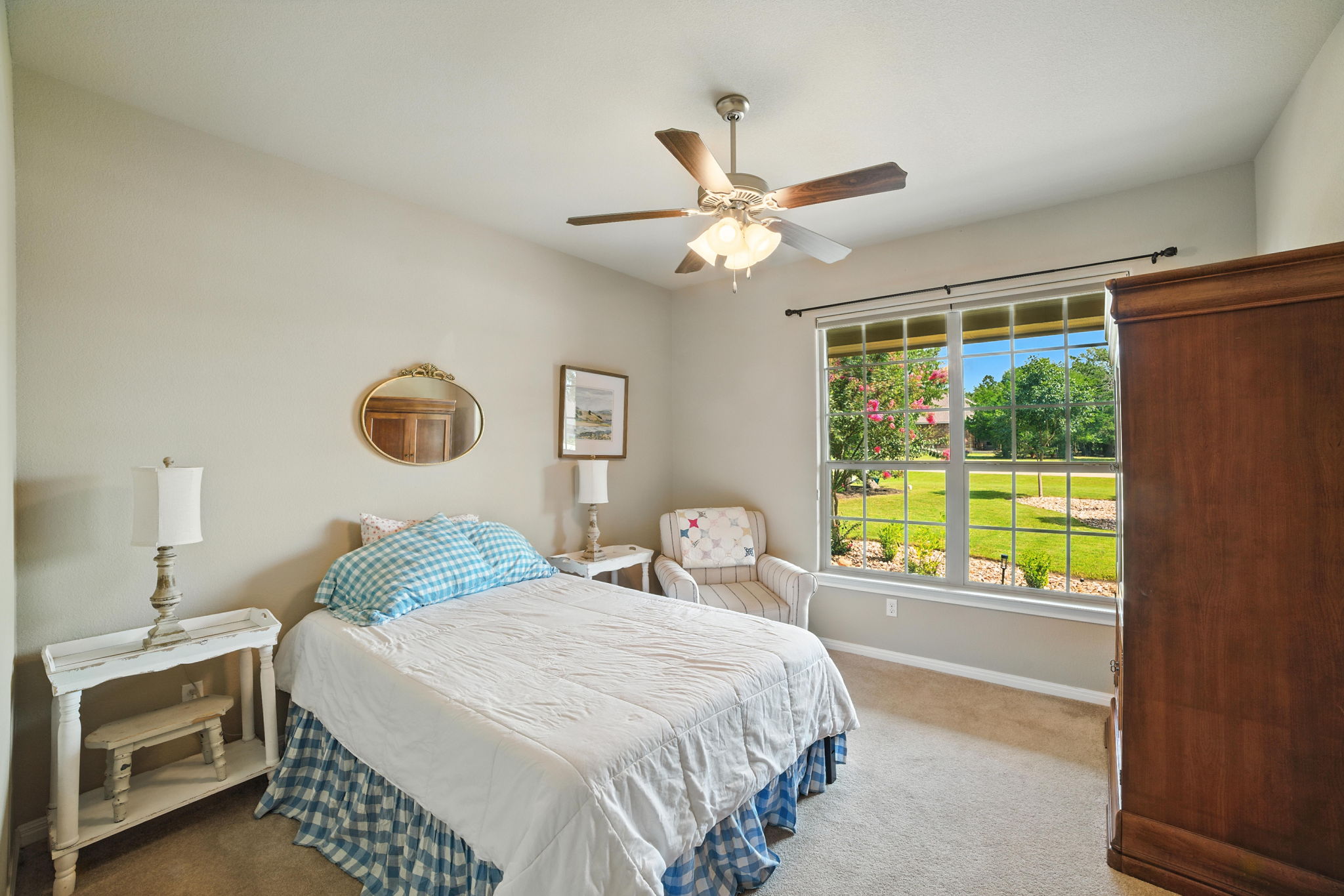 107 Tylee Circle Bastrop, TX 78602 - Photo 7 of 40 a bedroom with a large bed and a window