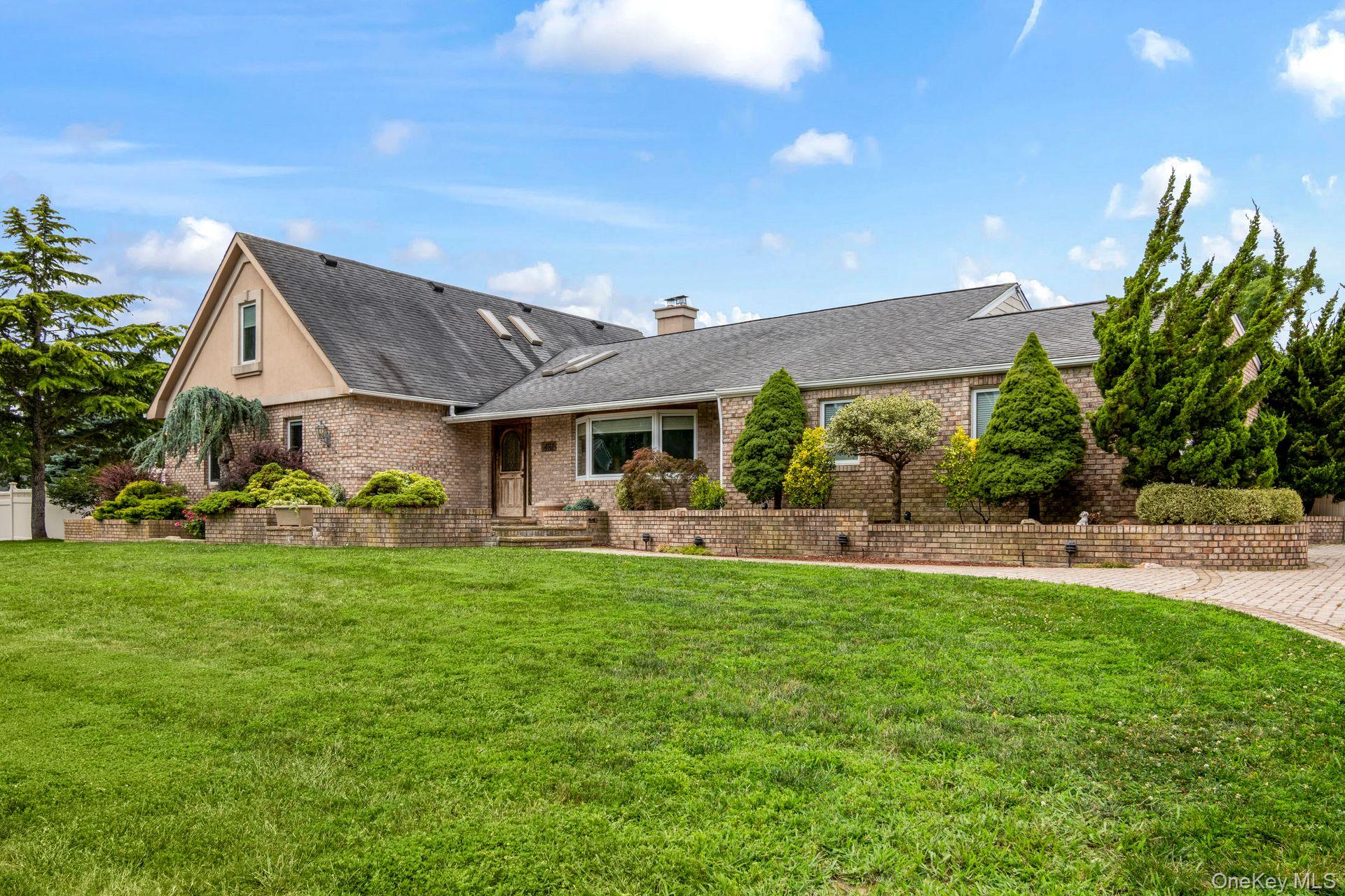 127 Church Road Great River, NY 11739 - Photo 1 of 1 a view of a house with backyard porch and sitting area