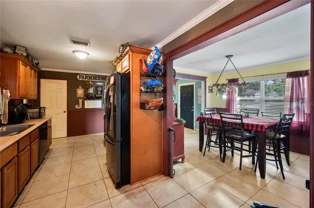 a view of a dining area with furniture window and outside view