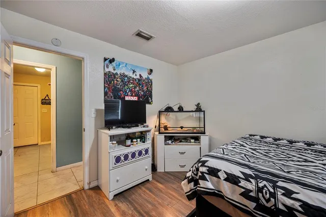 a kitchen with a stove and a refrigerator
