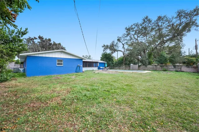 a view of backyard with green space
