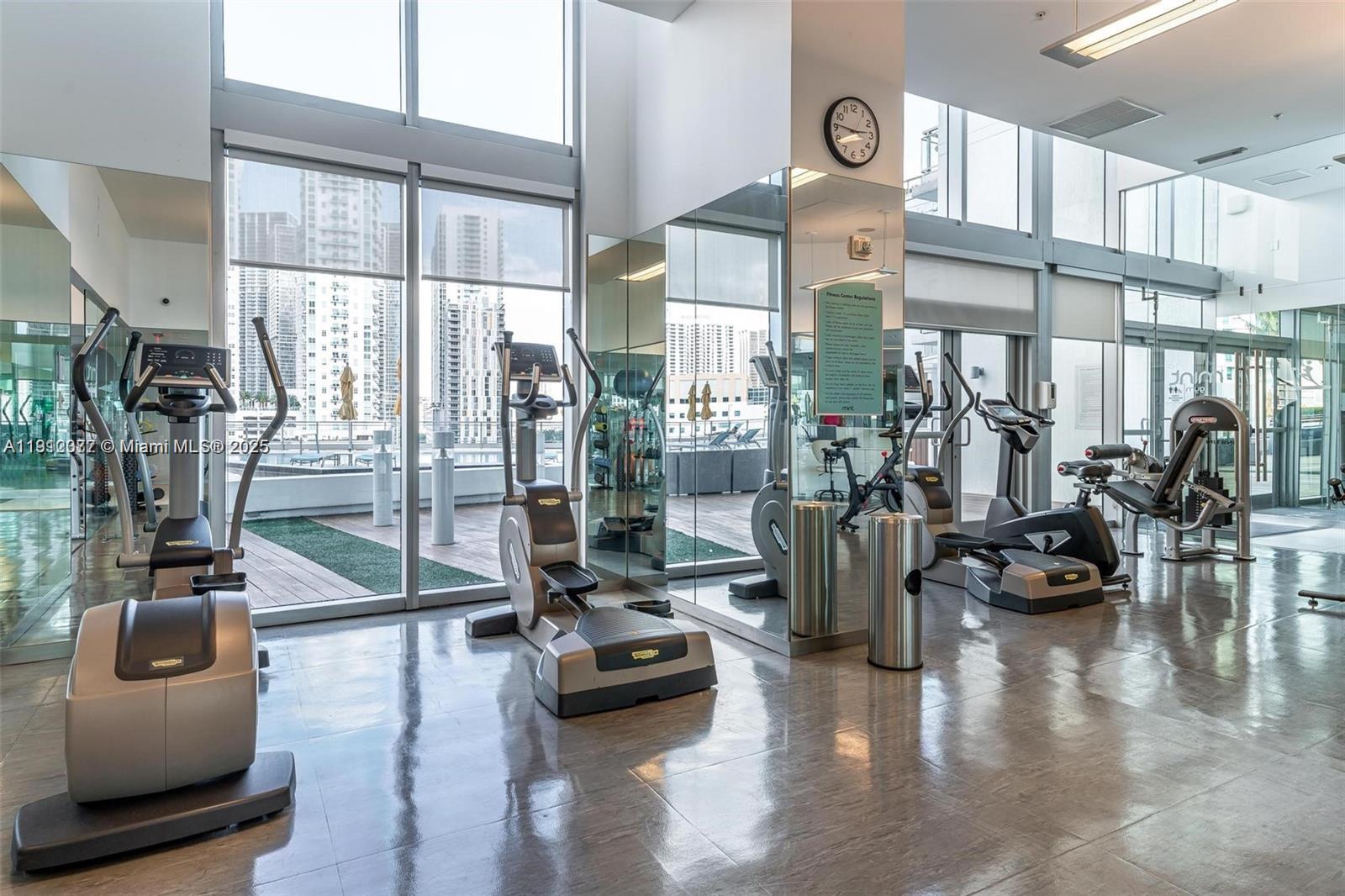 92 Southwest 3rd Street, Unit 4107 Miami, FL 33130 - Photo 26 of 30 a view of a room with gym equipment