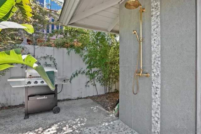 a view of a lake with houses in the back