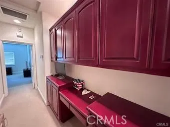 a view of a hallway with workspace