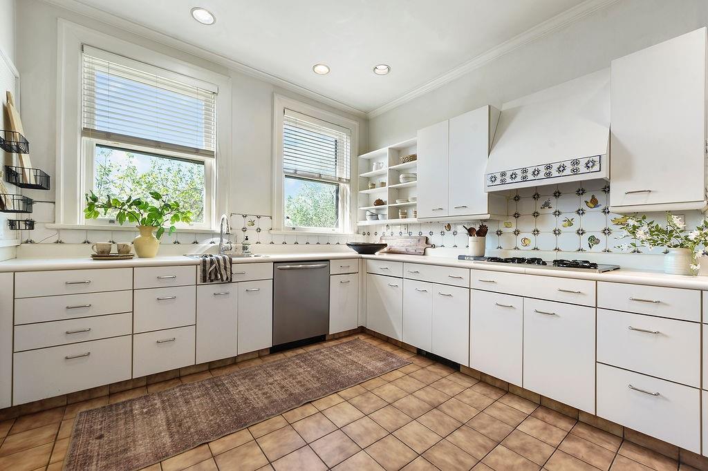2057 Beechwood Boulevard Pittsburgh, PA 15217 - Photo 11 of 49 a kitchen with sink cabinets and windows