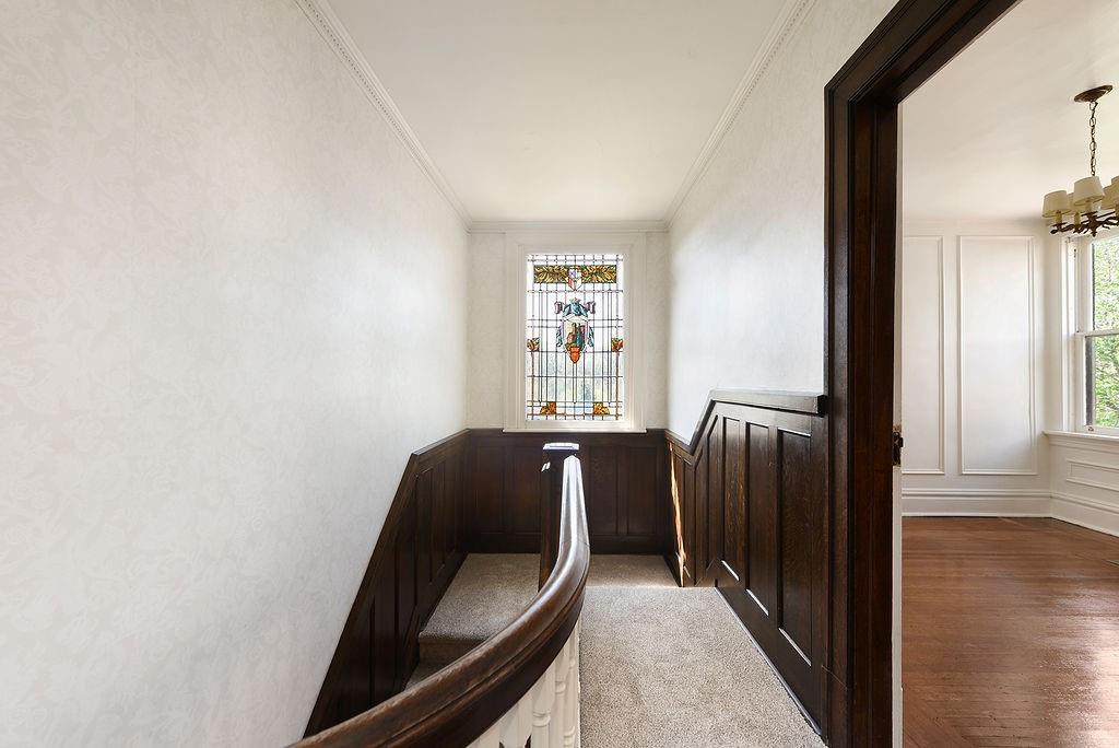 2057 Beechwood Boulevard Pittsburgh, PA 15217 - Photo 36 of 49 a view of a hallway with wooden floor and glass door