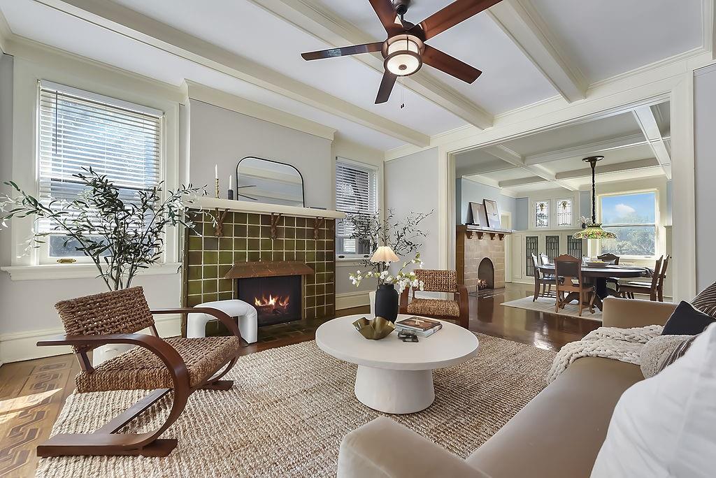 2057 Beechwood Boulevard Pittsburgh, PA 15217 - Photo 4 of 49 a living room with furniture a fireplace and a table