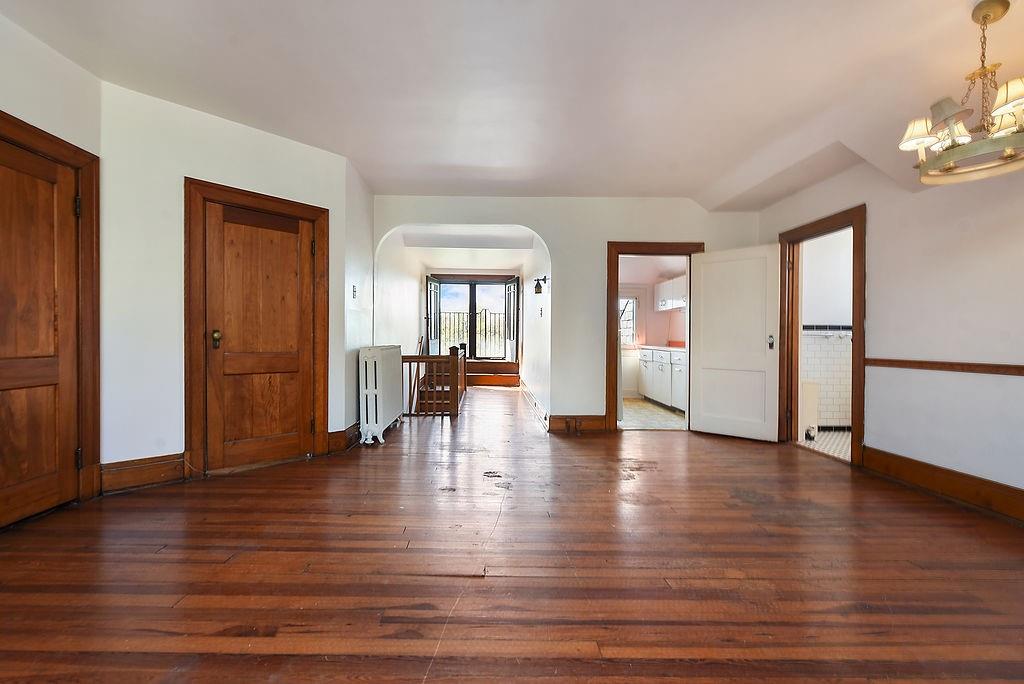 2057 Beechwood Boulevard Pittsburgh, PA 15217 - Photo 42 of 49 a view of an empty room with wooden floor and a window