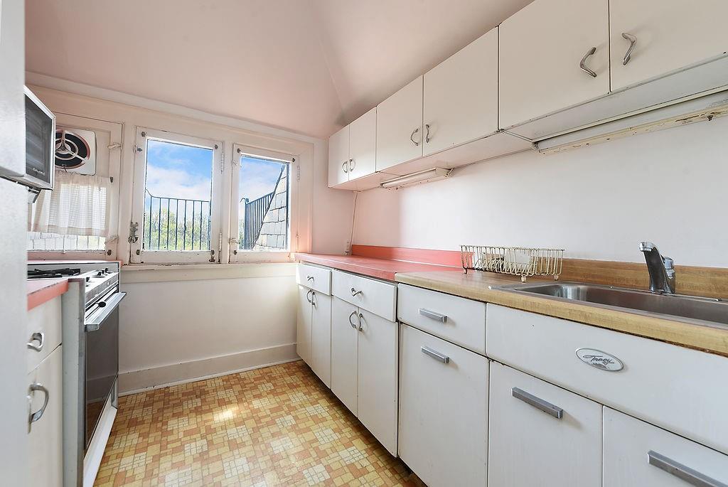 2057 Beechwood Boulevard Pittsburgh, PA 15217 - Photo 43 of 49 a kitchen with granite countertop cabinets stainless steel appliances and a sink
