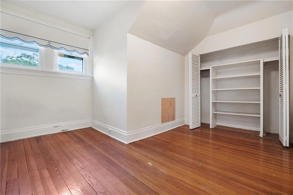 2057 Beechwood Boulevard Pittsburgh, PA 15217 - Photo 44 of 49 a view of an empty room with wooden floor and a window