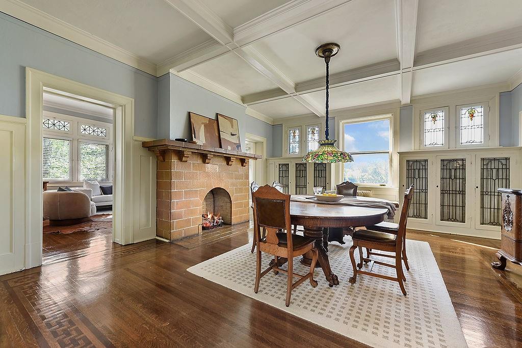 2057 Beechwood Boulevard Pittsburgh, PA 15217 - Photo 7 of 49 a view of a dining room with furniture and wooden floor