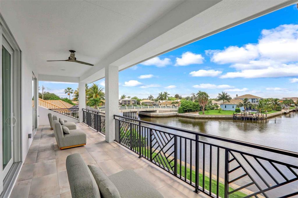1608 Windmill Avenue Marco Island, FL 34145 - Photo 21 of 34 a balcony with an ocean view
