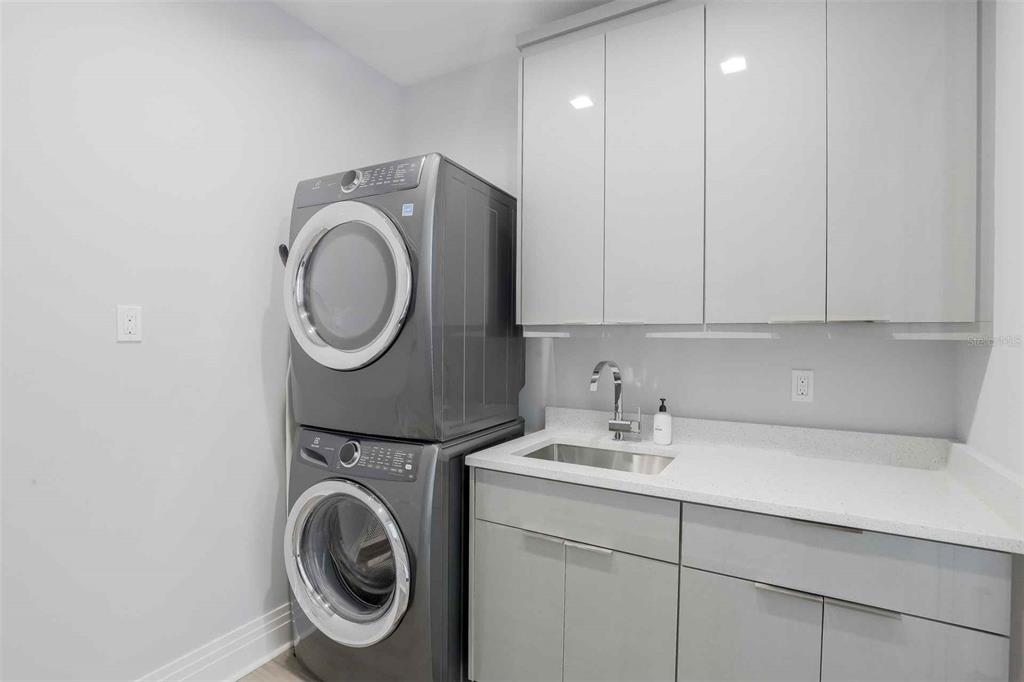 1608 Windmill Avenue Marco Island, FL 34145 - Photo 23 of 34 a utility room with sink dryer and washer