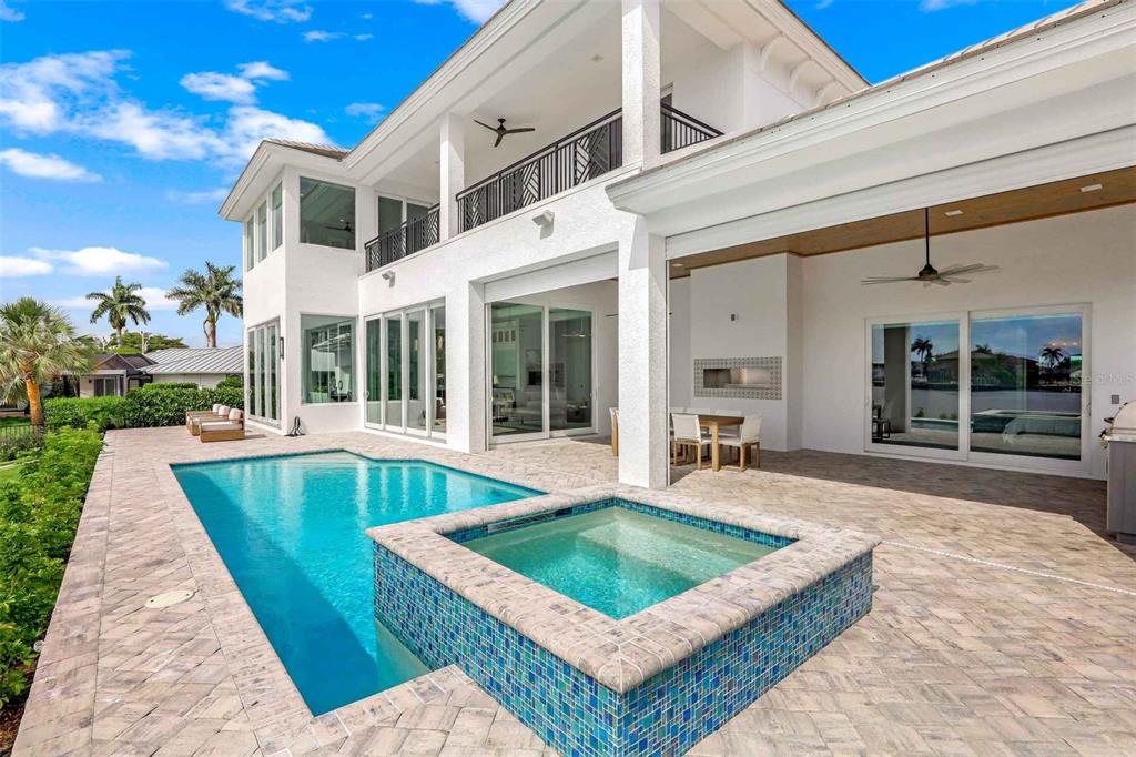 1608 Windmill Avenue Marco Island, FL 34145 - Photo 25 of 34 a view of an house with swimming pool and sitting area