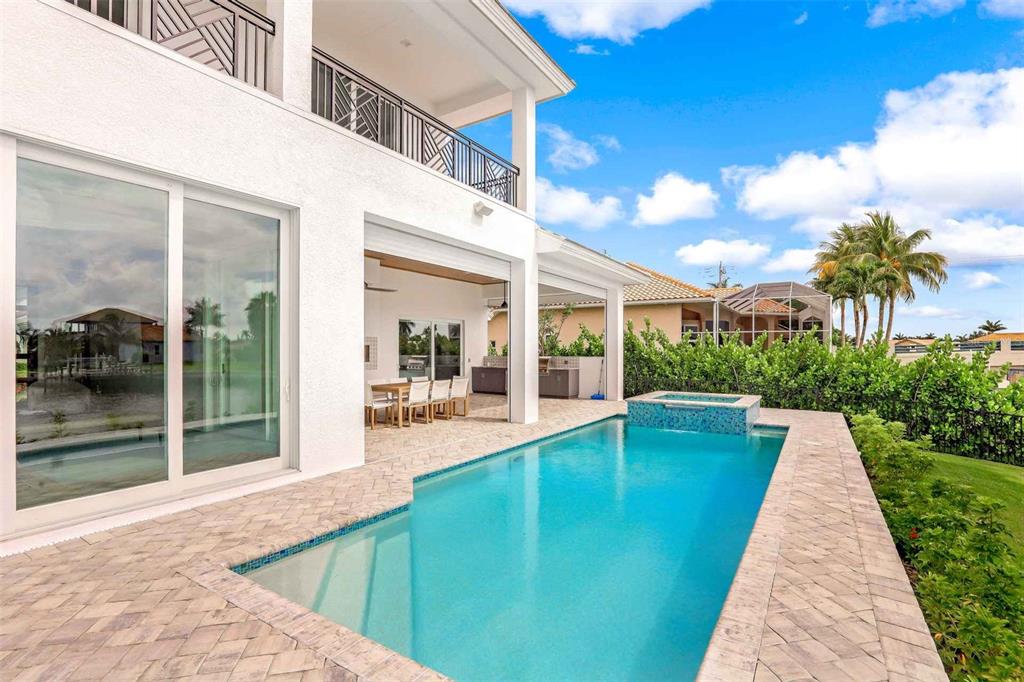 1608 Windmill Avenue Marco Island, FL 34145 - Photo 30 of 34 a view of swimming pool with a patio
