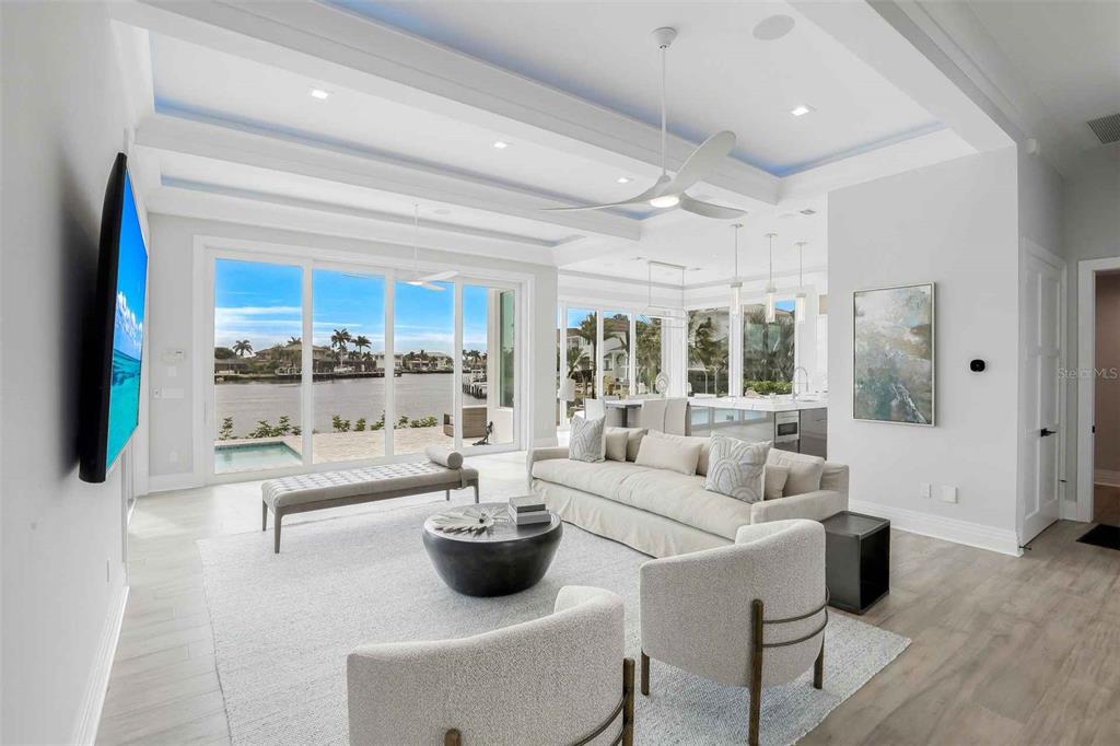 1608 Windmill Avenue Marco Island, FL 34145 - Photo 3 of 34 a living room with furniture and a large window