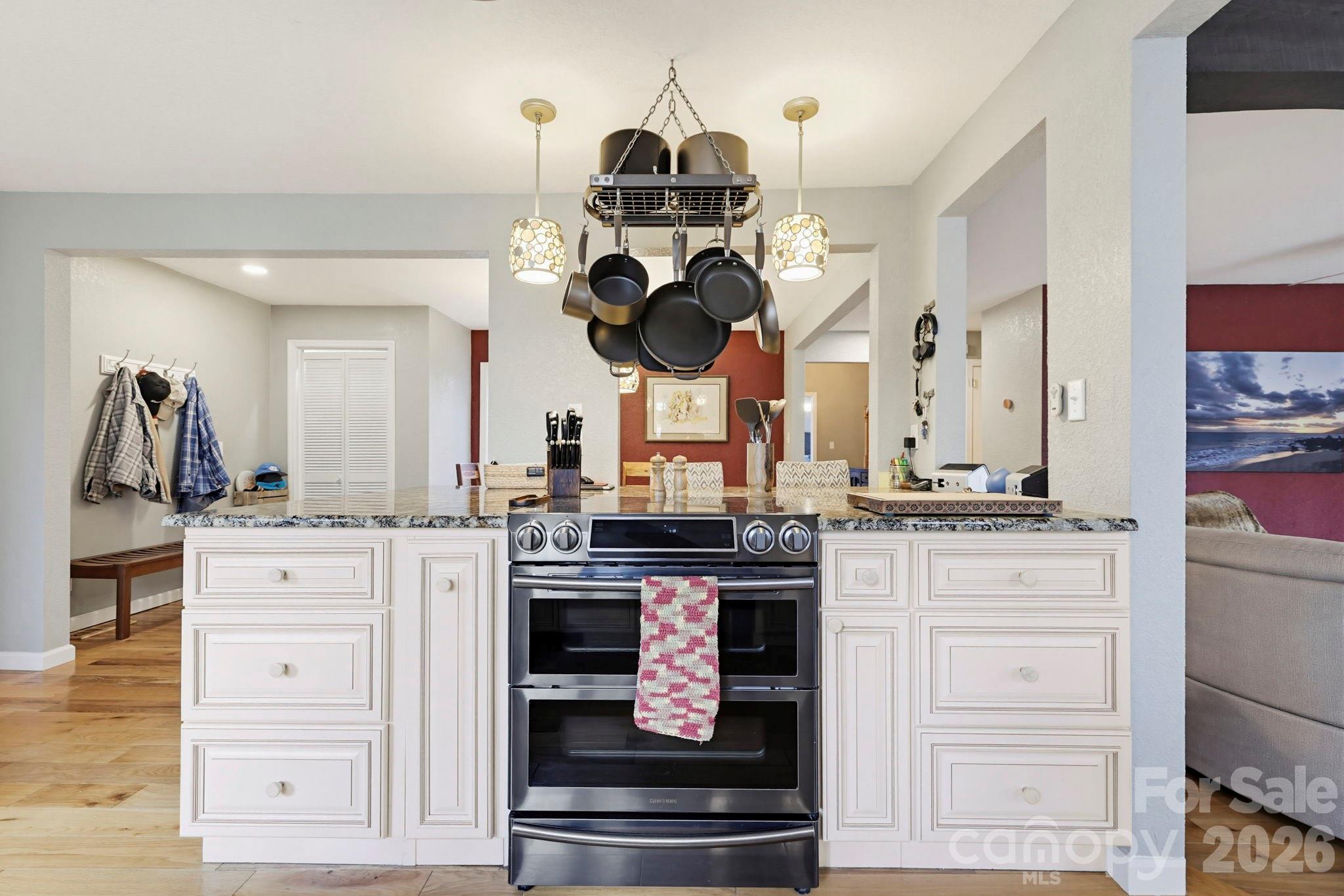 27 Spring Hill Circle Arden, NC 28704 - Photo 11 of 47 a kitchen with stainless steel appliances granite countertop a stove and a sink