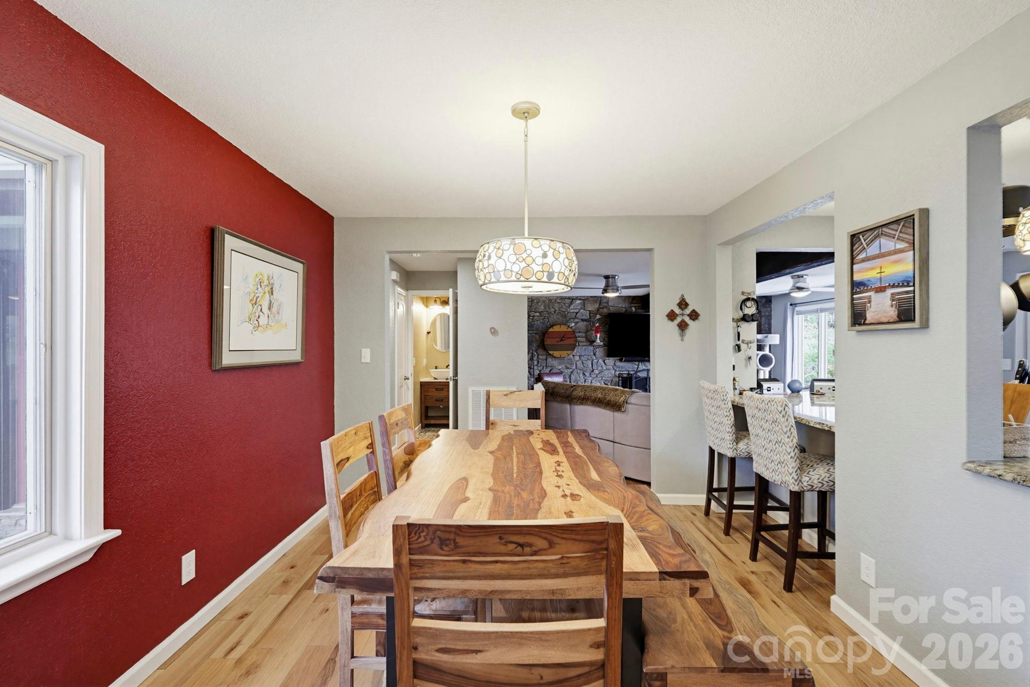 27 Spring Hill Circle Arden, NC 28704 - Photo 15 of 47 a view of a dining room with furniture