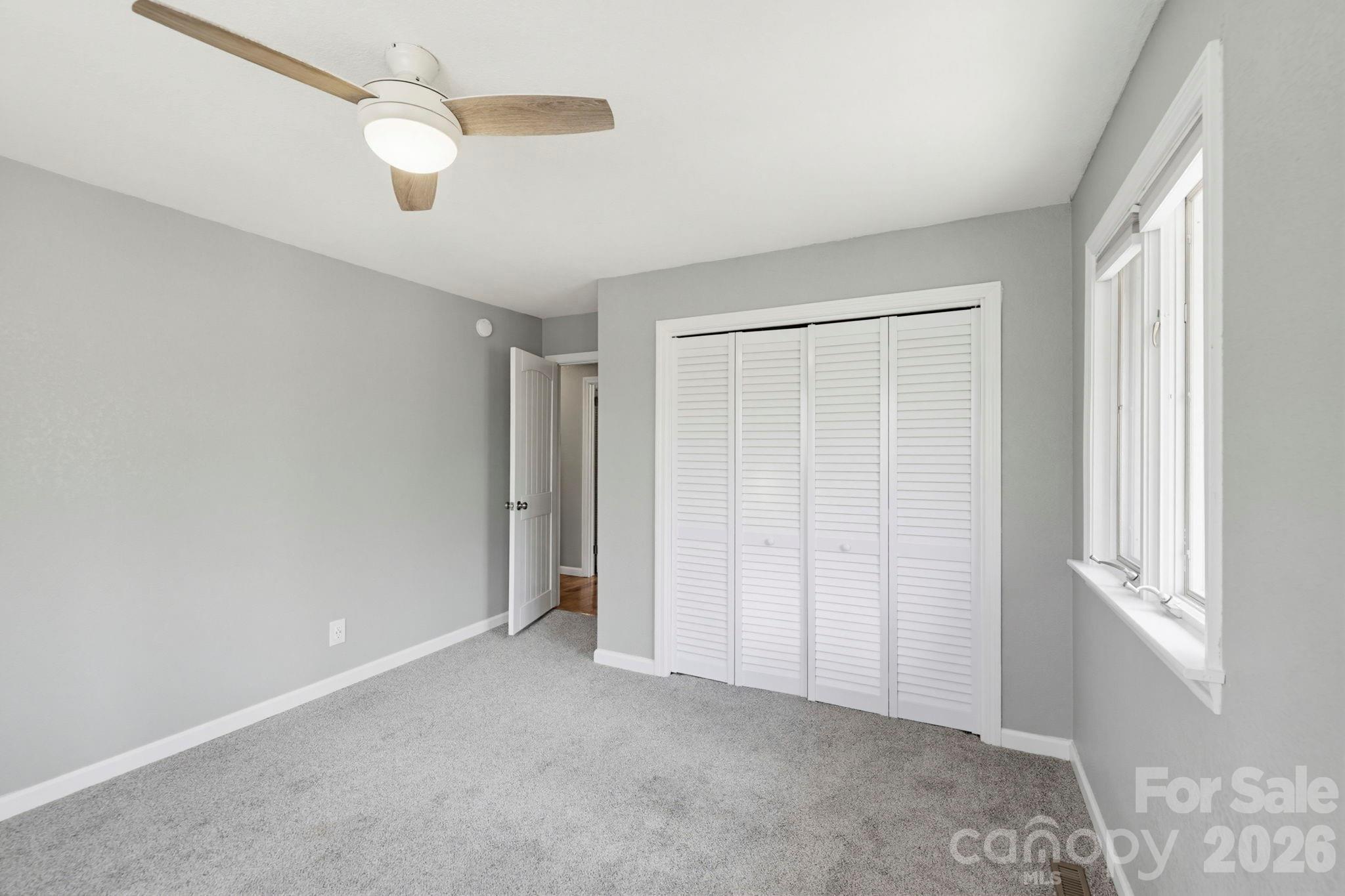 27 Spring Hill Circle Arden, NC 28704 - Photo 33 of 47 a view of an empty room with a window