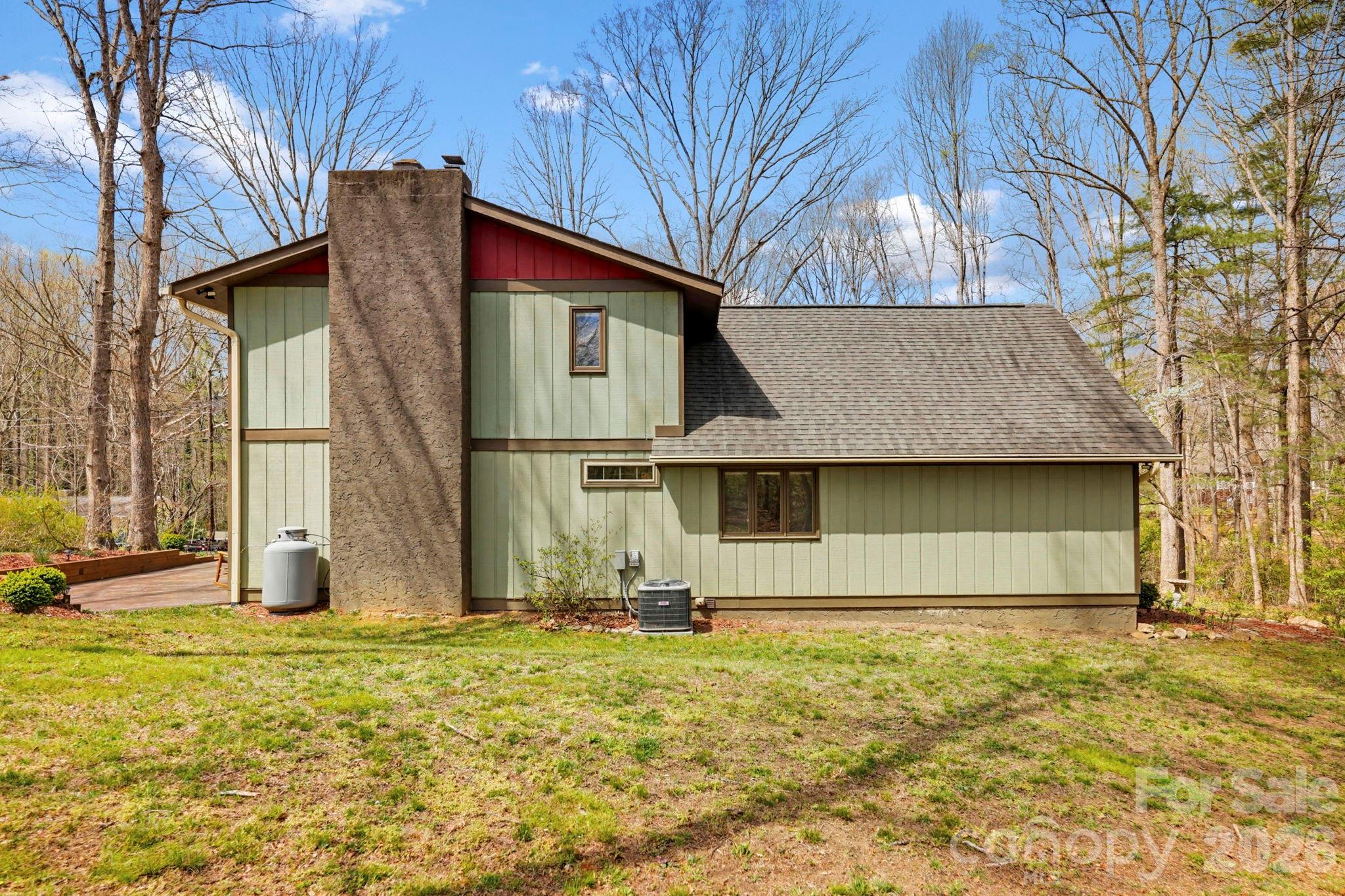 27 Spring Hill Circle Arden, NC 28704 - Photo 40 of 47 a front view of a house with garden