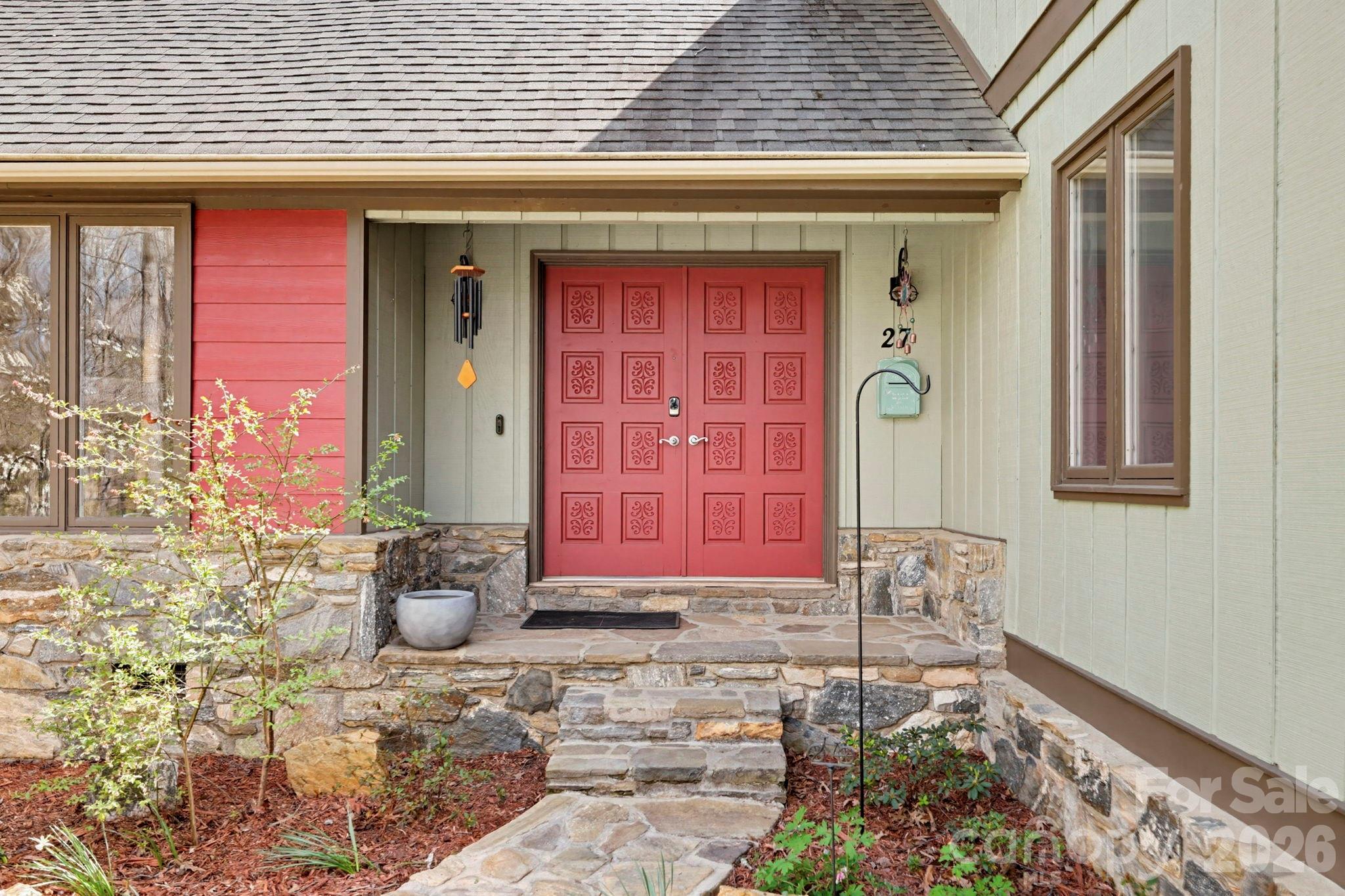 27 Spring Hill Circle Arden, NC 28704 - Photo 4 of 47 a front view of a house with a yard